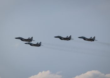 MIG-29 počas rozlúčkového preletu a privítania stíhačiek Českej republiky a Poľska, ktoré symbolicky prevezmú ochranu nášho vzdušného priestoru v rámci Medzinárodných leteckých dní SIAF 2022 na Leteckej základni Malacky - Kuchyňa. Kuchyňa, 27. august 2022 (Foto: SITA/Jana Birošová)
